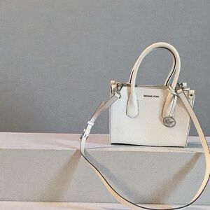 Brand New with tag . Michael Kors Cream Bag ( not a mini)
